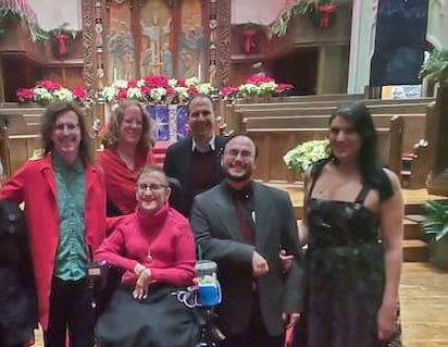 Nancy with her family, Christmas Eve 2023 at Foundry